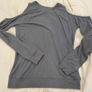 Shirt with shoulder cut out